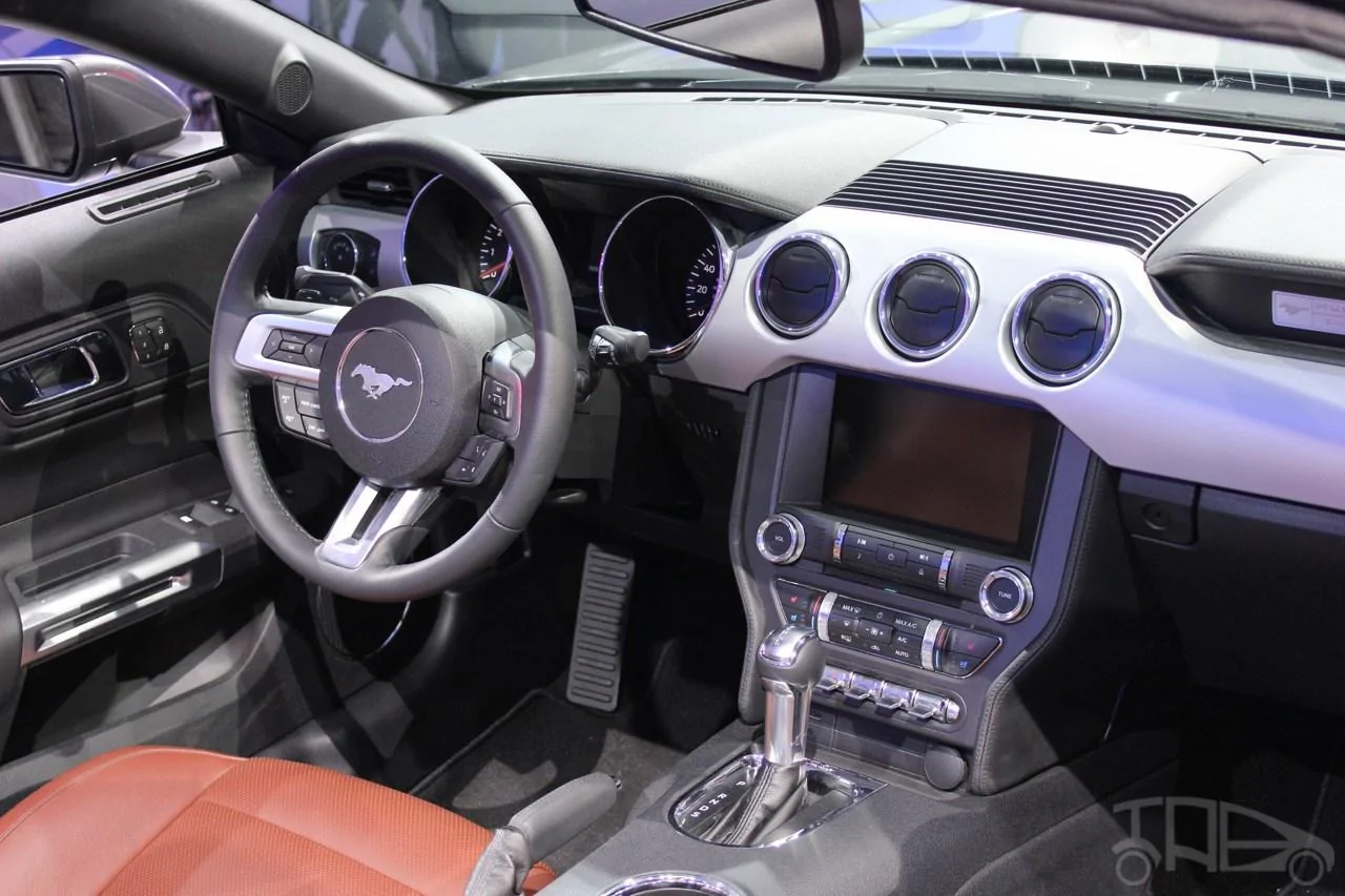 50th Yellow Window Switch 2015-Ford-Mustang-Convertible-at-2014-NAIAS-steering.webp