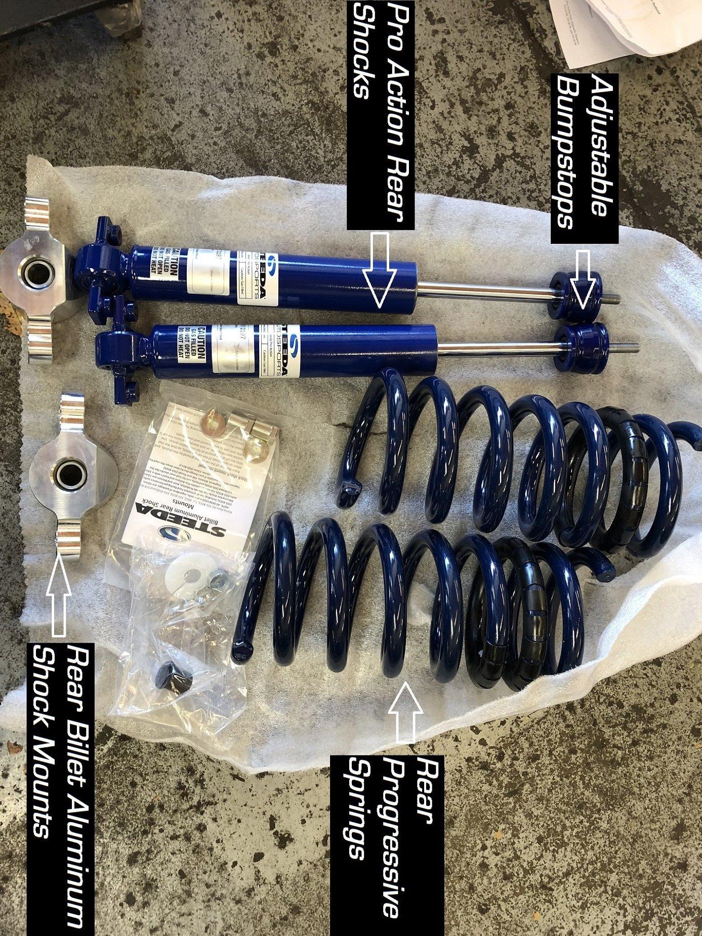 Steeda rear pro action shocks, rear progressive springs, rear shock mounts and bumpstops.JPG