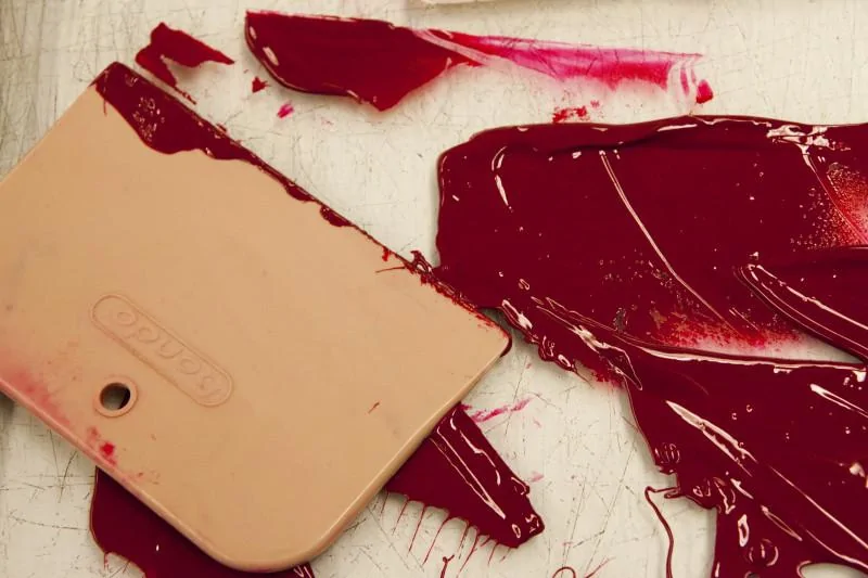 red-etching-ink-on-an-inking-slab-with-a-bondo-scraper_medium.webp