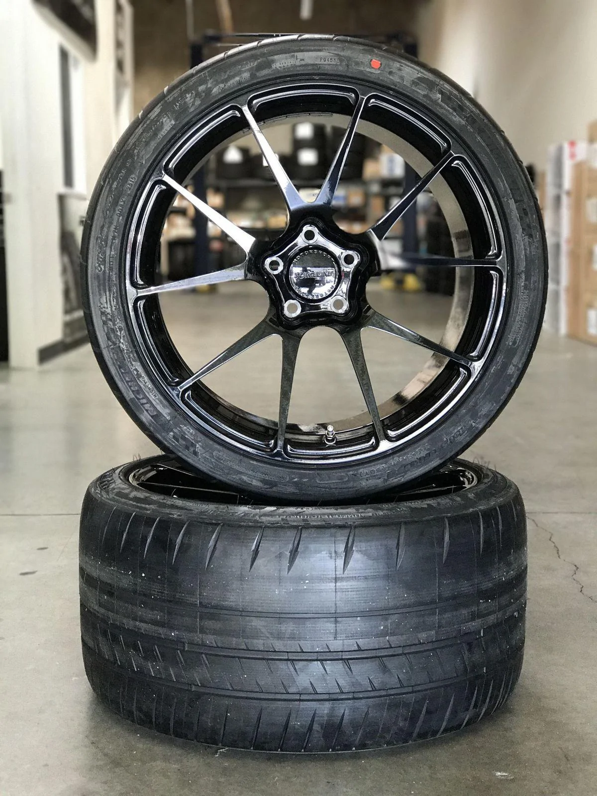 forgeline-ga1r-open-lug-gloss-black-concave-wheels-michelin-sport-cup-2-track-wheels.webp