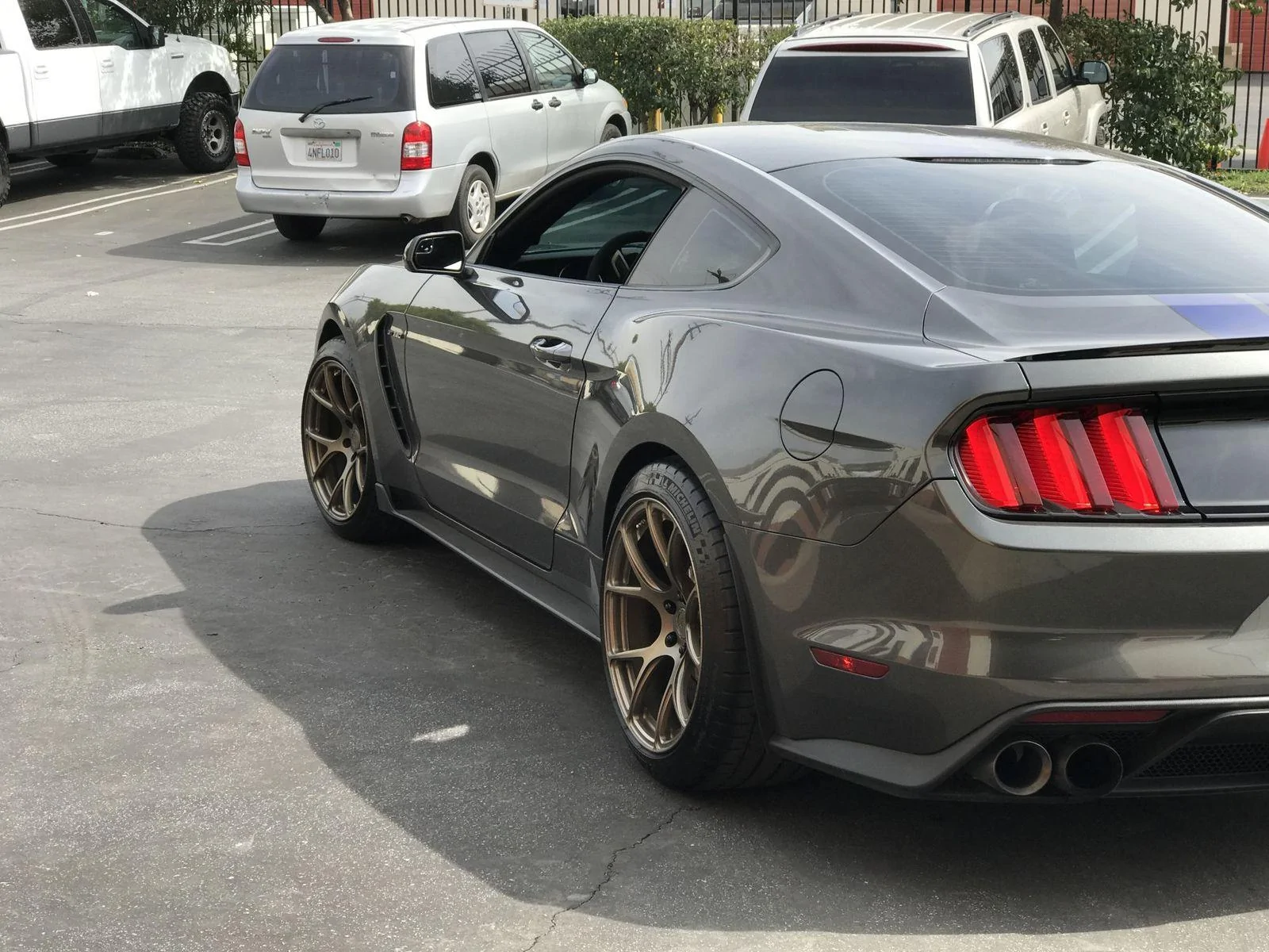 magnetic-shelby-gt350-bc-forged-rz05-satin-bronze-concave-r-spec-wheels.webp
