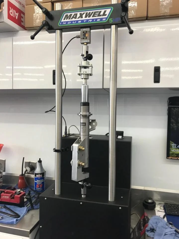 Ohlins-Mustang-Front-Strut-On-Shock-Dyno.webp