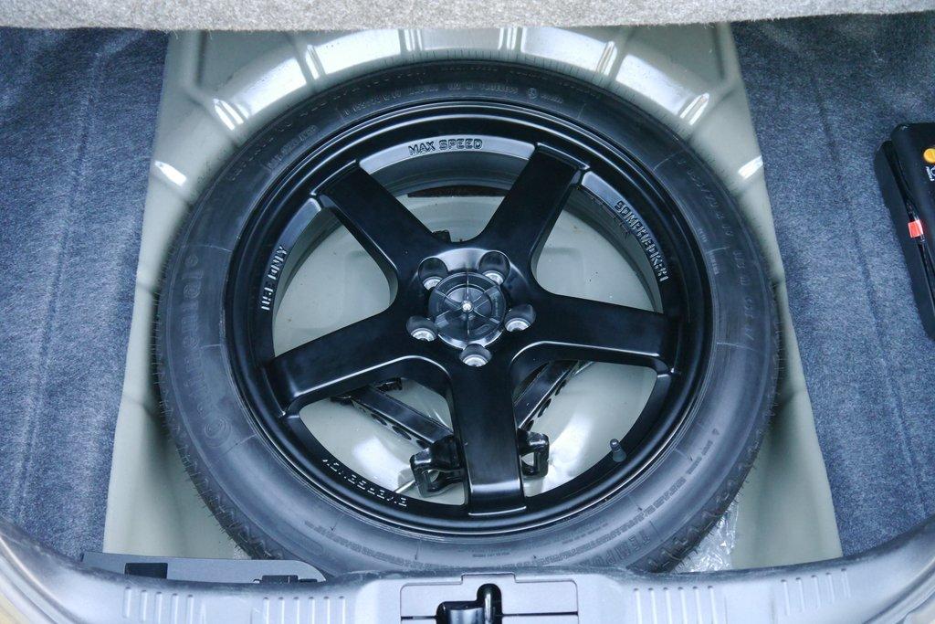 spare_tire_in_trunk_1024x1024.jpg