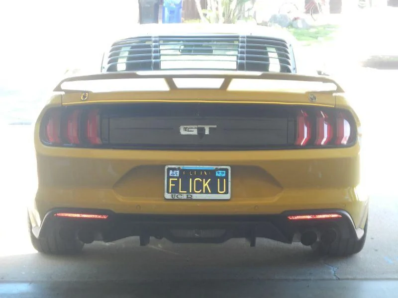 YellowCarRearViewWithReflectiveGTDSCN4785.webp
