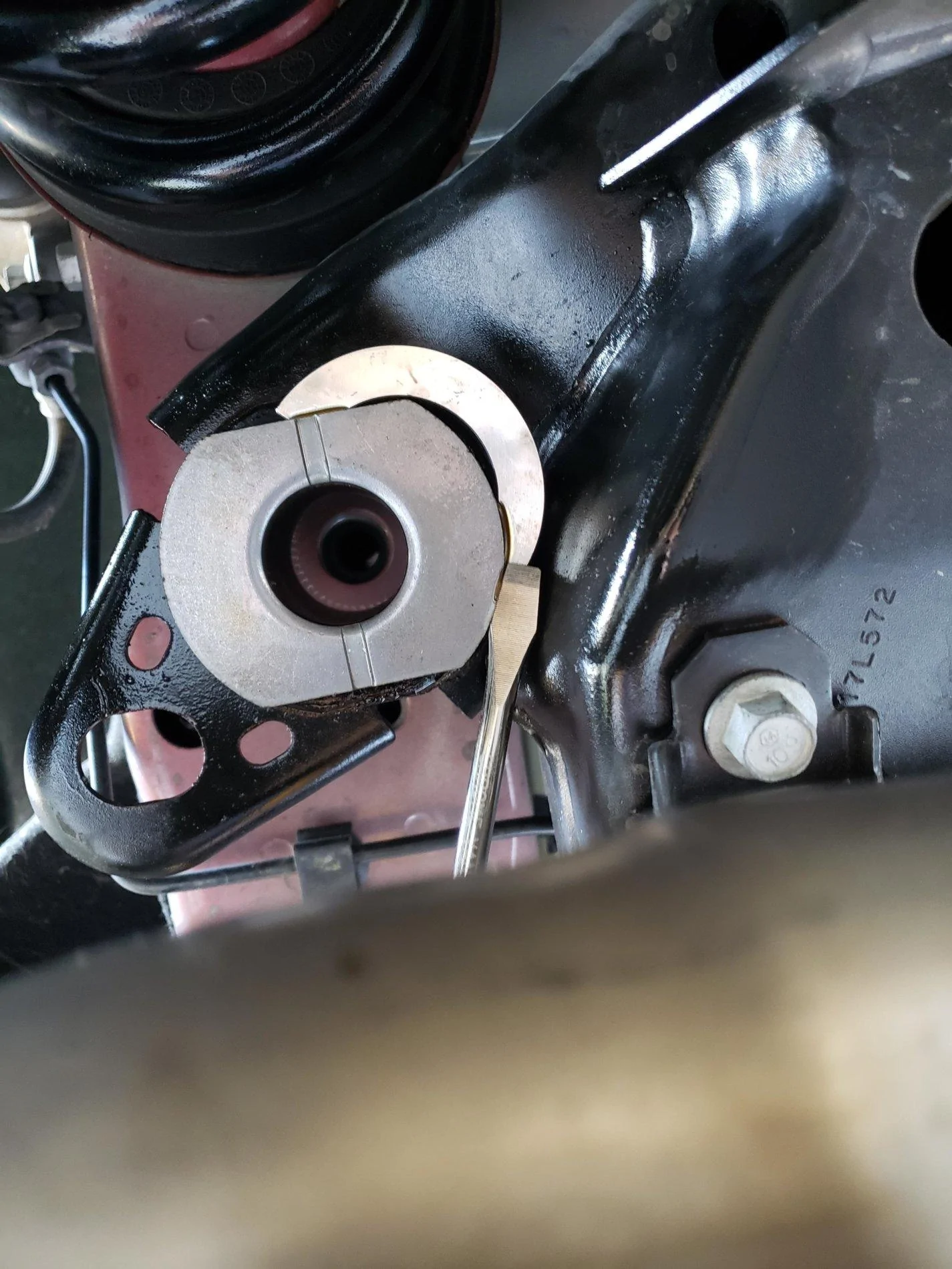 passenger rear subframe bolt.webp