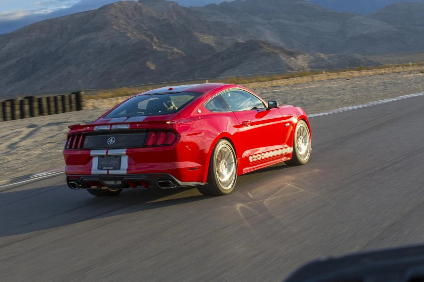 2015-ford-shelby-gt-rear-three-quarter-in-motion.webp