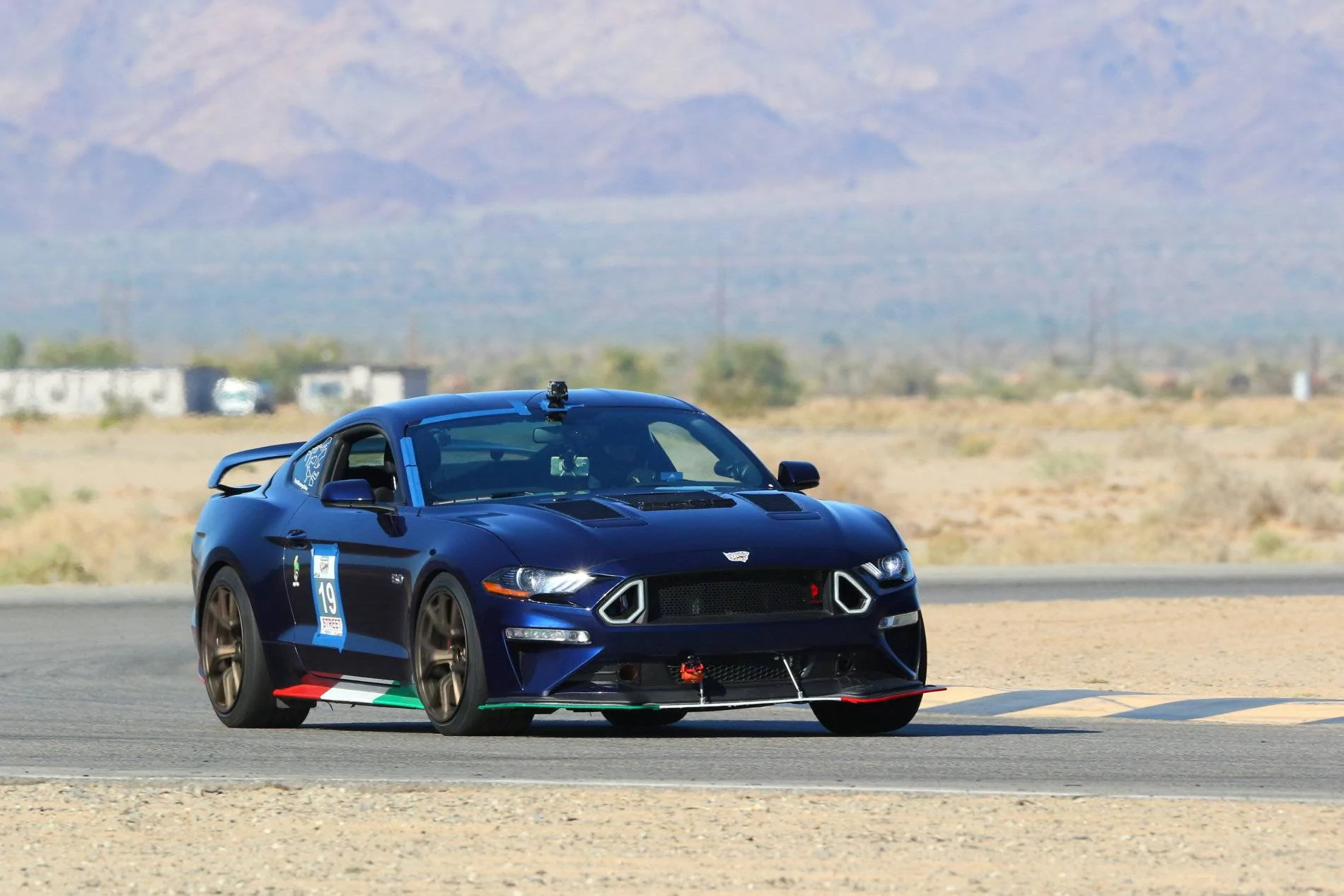 Yellow Group-Turn 4-CVR_0408_0931_Oct1919_CaliPhoto.webp