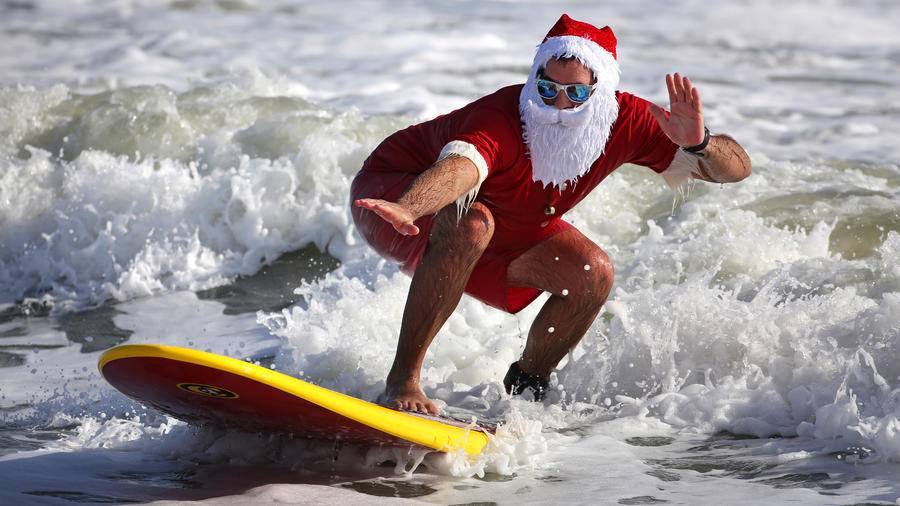 surfing-santa-cocoa-beach-460823706.jpg