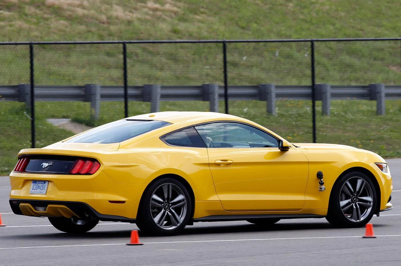 2015-Ford-Mustang-EcoBoost-rear-side-view.webp