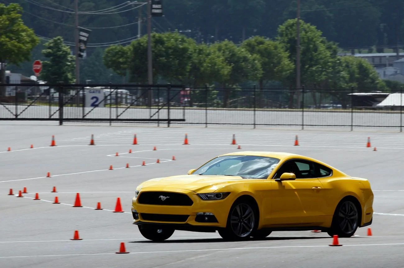 2015-Ford-Mustang-EcoBoost-yellow-autocrossing.webp