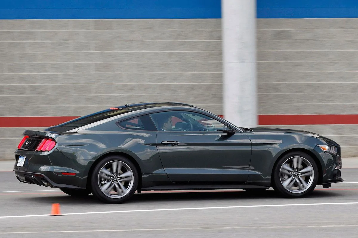 2015-Ford-Mustang-EcoBoost-side-view-in-motion.webp