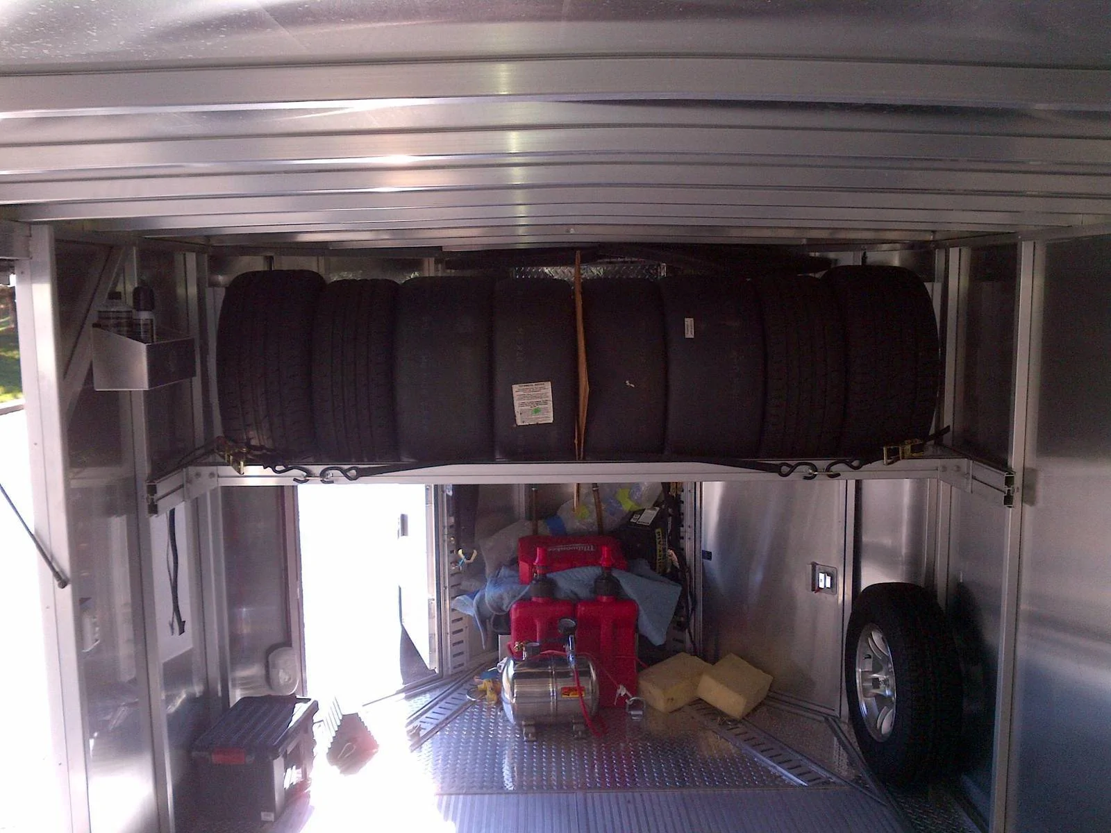 773000d1382757271-fs-2010-trailex-enclosed-car-hauler-trailex-tire-rack-jpg.webp