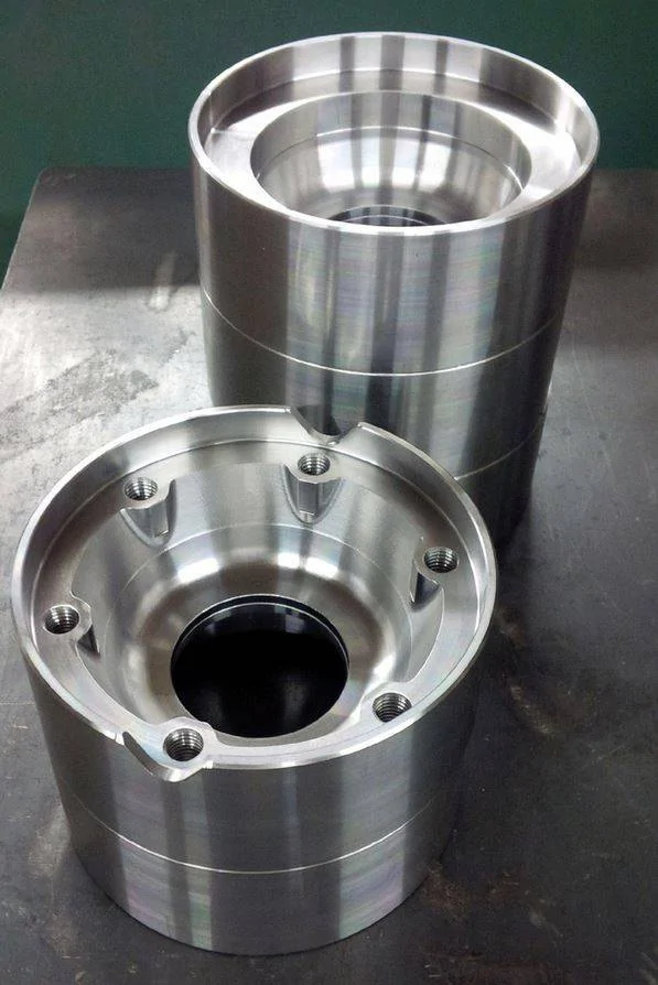 ZZ 2013GT500 CF shaft adapters being machined.webp