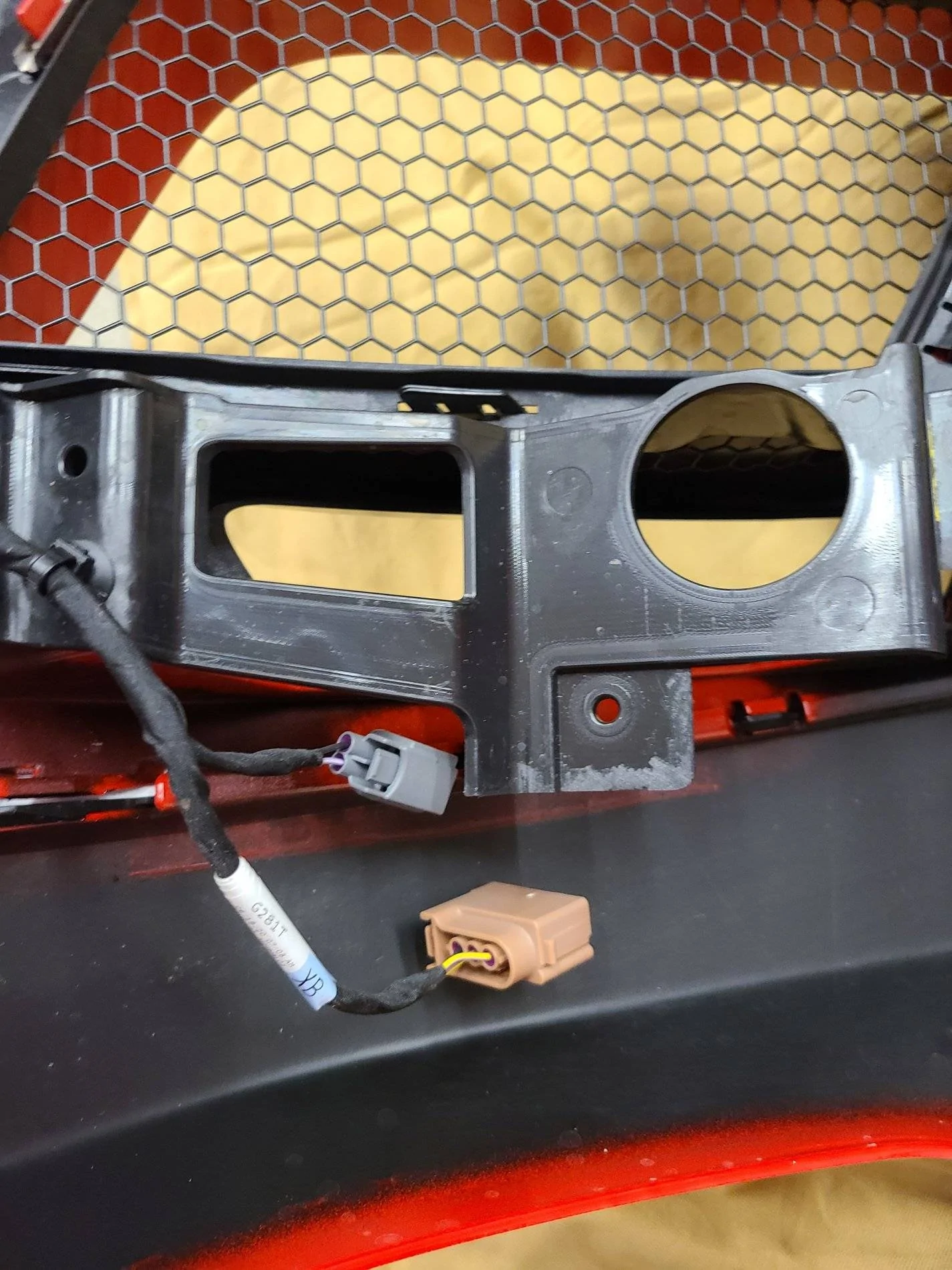 uncut parking light bracket.webp