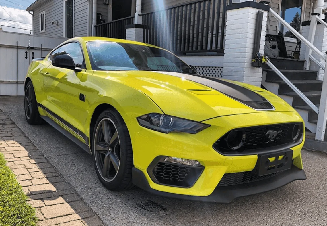21MY Mach 1 Euro Spec Grabber Yellow.webp