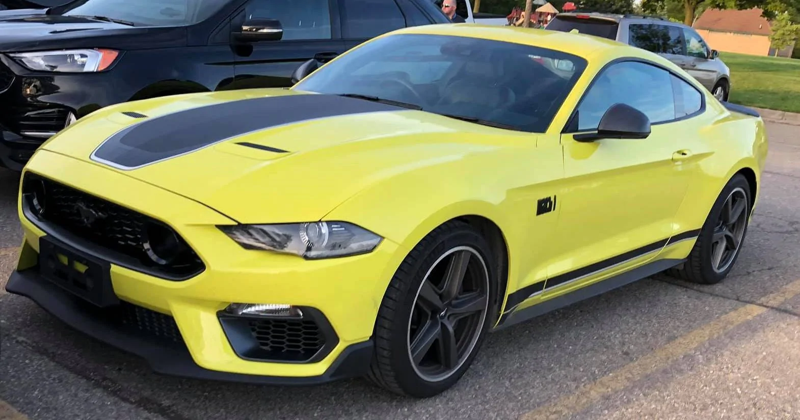 21MY Mach 1 RHD Grabber Yellow 1.webp
