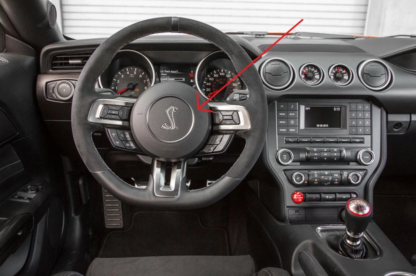 2016-Ford-Shelby-GT350-Mustang-in-red-interior-steering-wheel1.webp