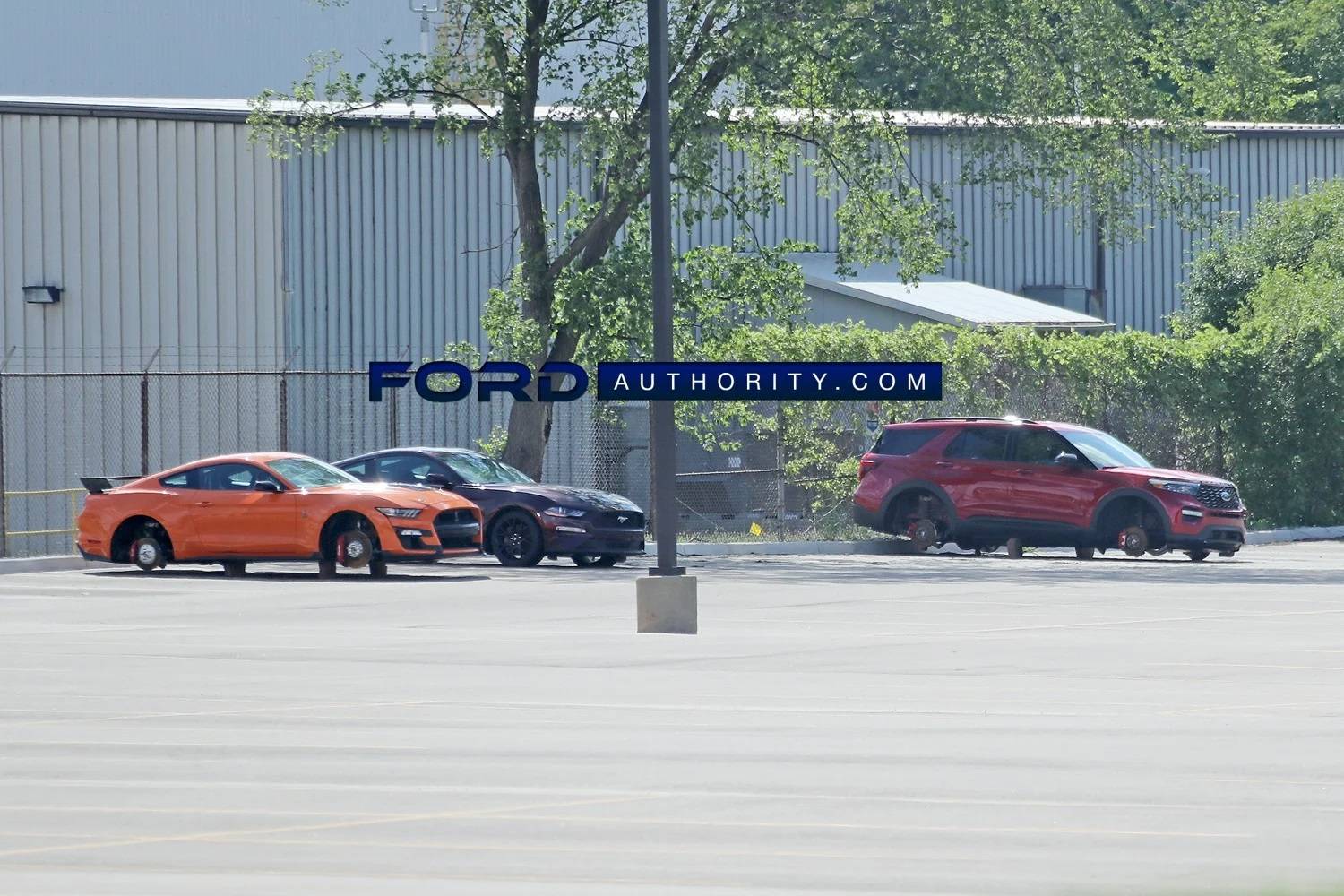 Ford-Mustang-GT-Mustang-Shelby-GT500-Ford-Explorer-ST-on-blocks-stolen-wheels-USPS-Detroit-Dis...jpg