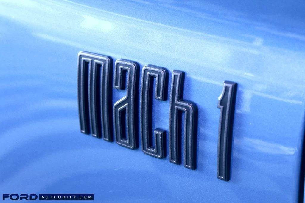 2021-Ford-Mustang-Mach-1-Exterior-Velocity-Blue-017-Mach-1-logo-badge-on-front-fender-1024x683.jpg