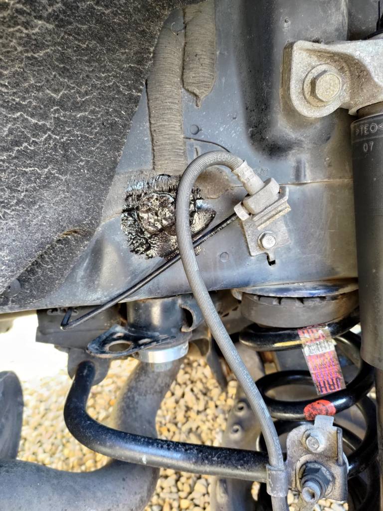Seam_Hole_Drivers_Side_Painted.jpg
