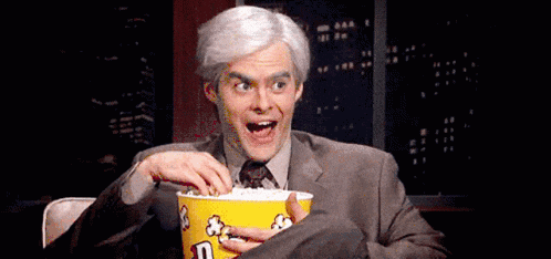 eating-popcorn-im-watching.gif