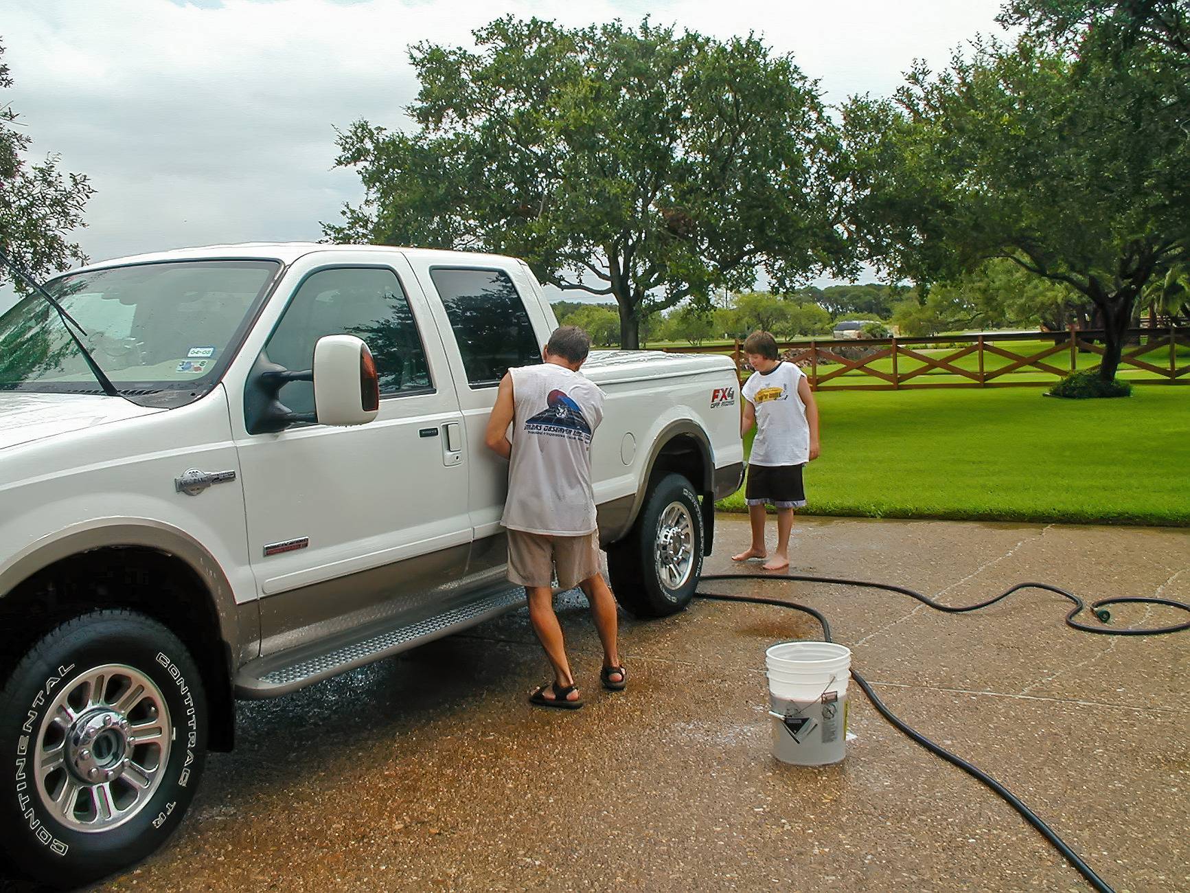 kb-logan-washing-truck-in-the-rain.jpg