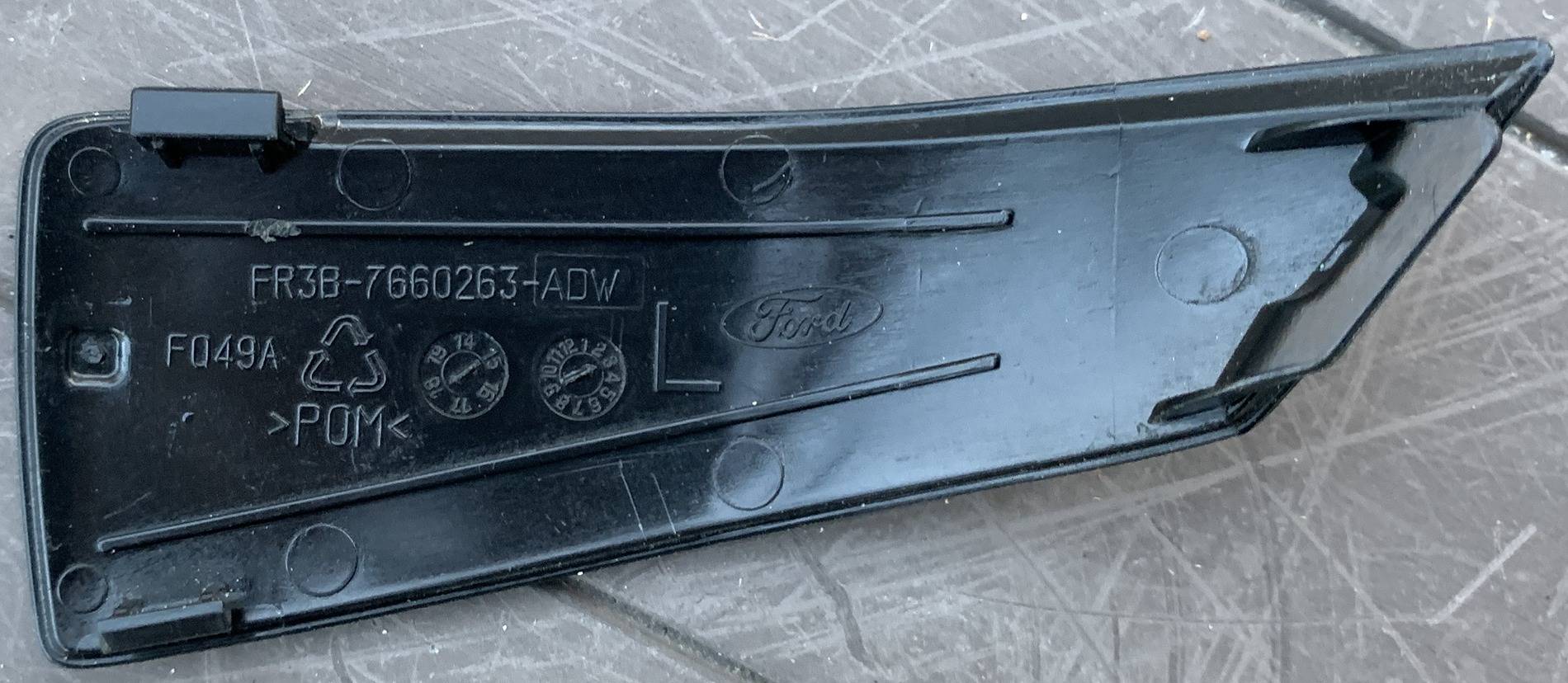 Cover Seat Belt Upper Driver Side.jpg