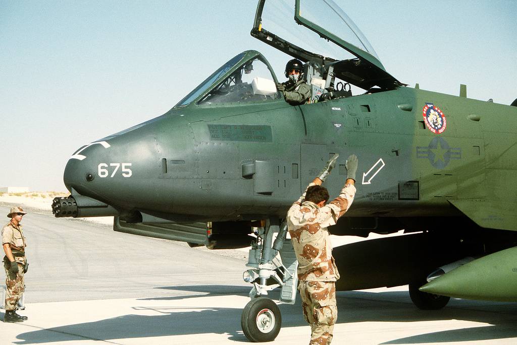 Desert Storm, green A-10 in Saudi Arabia, Airmen w 'chocolate chip' DCUs.jpg