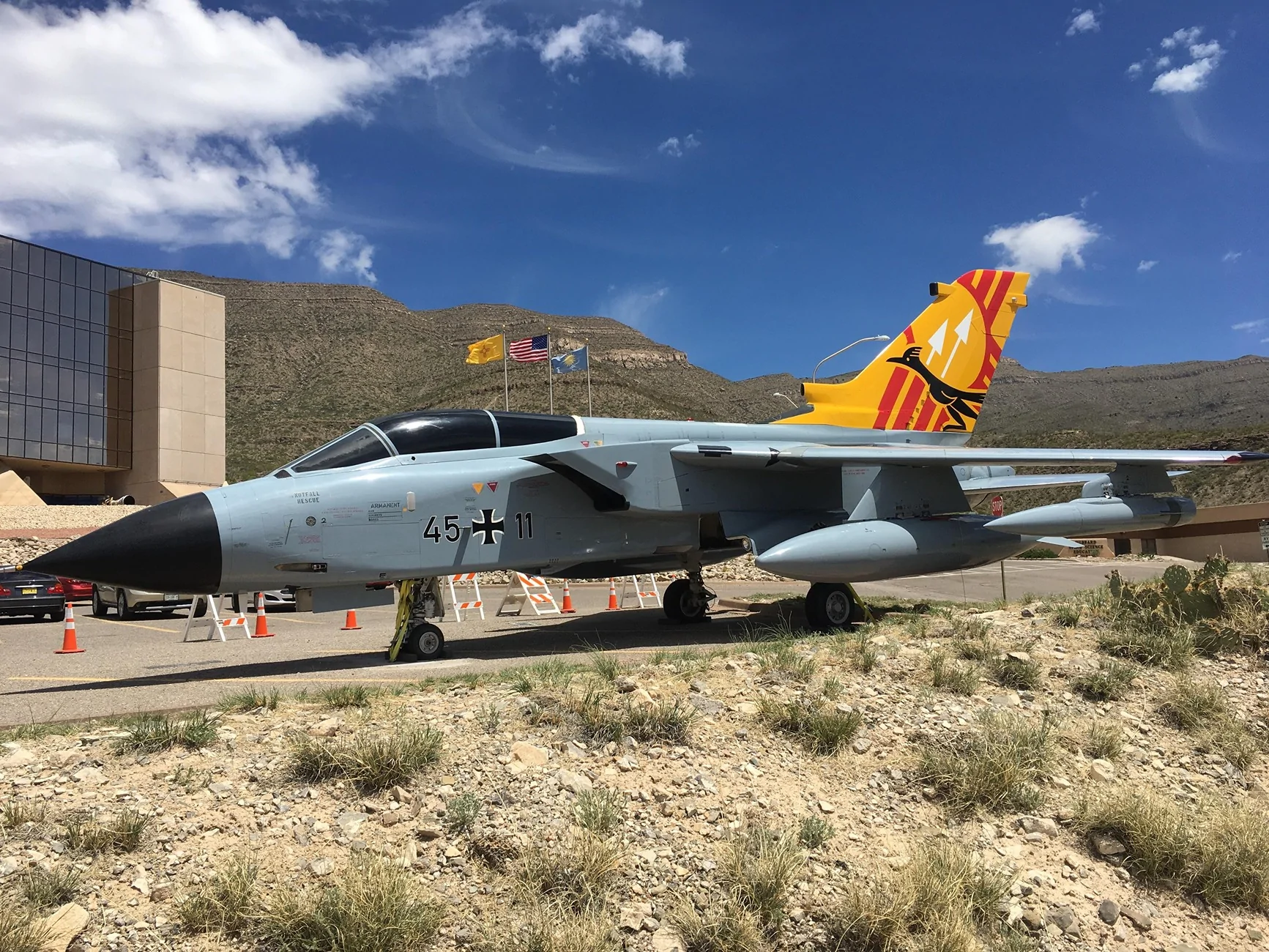 Tornado bomber, in NM, w roadrunner on the tail.webp