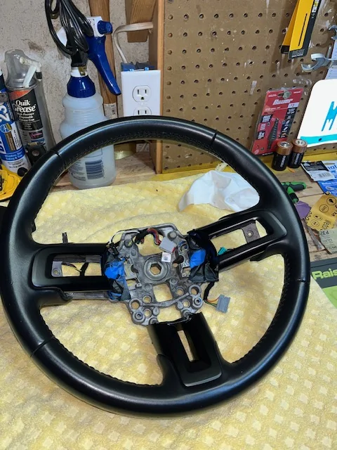 steering wheel satin black trim.webp