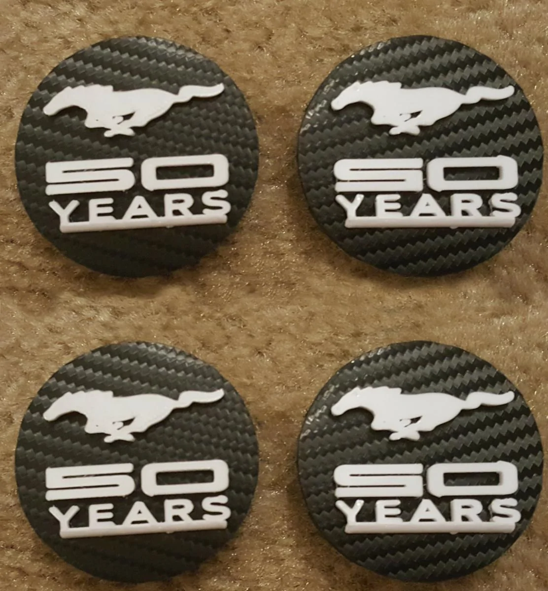 50 years center caps.webp