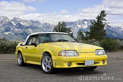 1991-ford-mustang-convertible-yellow-12399767.webp