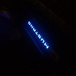 Door sills with blue ambient lighting.