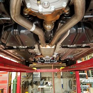 I had the resonator removed and replaced with a custom X pipe at my muffler shop. Sounds great. Increased the sound by at least 50% Not too much.