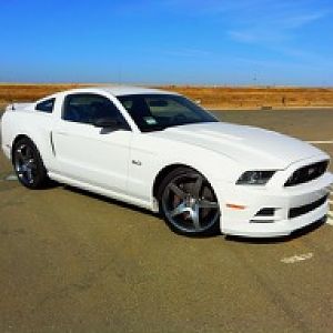 2013 GT (Mustang Customizer Winner #1: California Special Side Scoops, GT500 Rear Spoiler, Roush Hyperblack 20" Rims, Falken Azenis PT722 Tires, Eibac