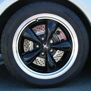 Baer brakes with cross-drilled and slotted rotors.