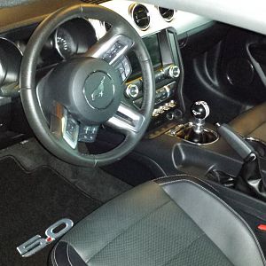 Black Mustang GT Premium:
Manual, Eibach Sportline Springs, Velgen VMB7 Wheels, Nitto Invo Tires, Bassani 3" Catback Exhaust, Steeda CAI