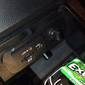 The little black knob controlling the subwoofer resides inside the center console. I don't need to take my eyes off the road to adjust the bass.