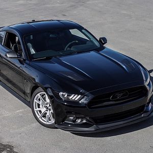 Not another murdered Stang. Matte black vinyl accents on mirror caps and heat extractors. Roush extractors coming soon. Silver wheels are staying. For