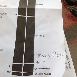 There is no piece for the space in front of the hood.