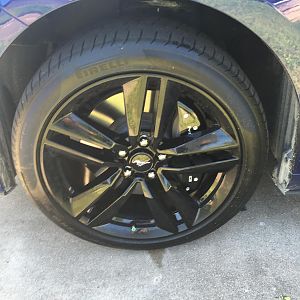 Rear caliper cover w/ wheel