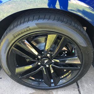 Front caliper cover w/ wheel