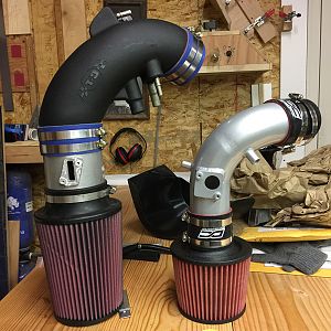 The intake off of my Acura VS the new intake for the mustang.  More parts waiting to go on the car!